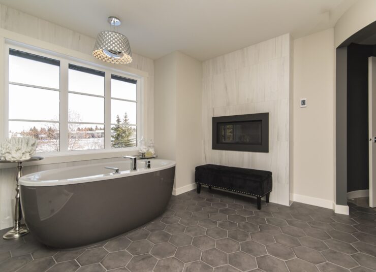 A beautiful shot of a modern house bathroom with technology and art